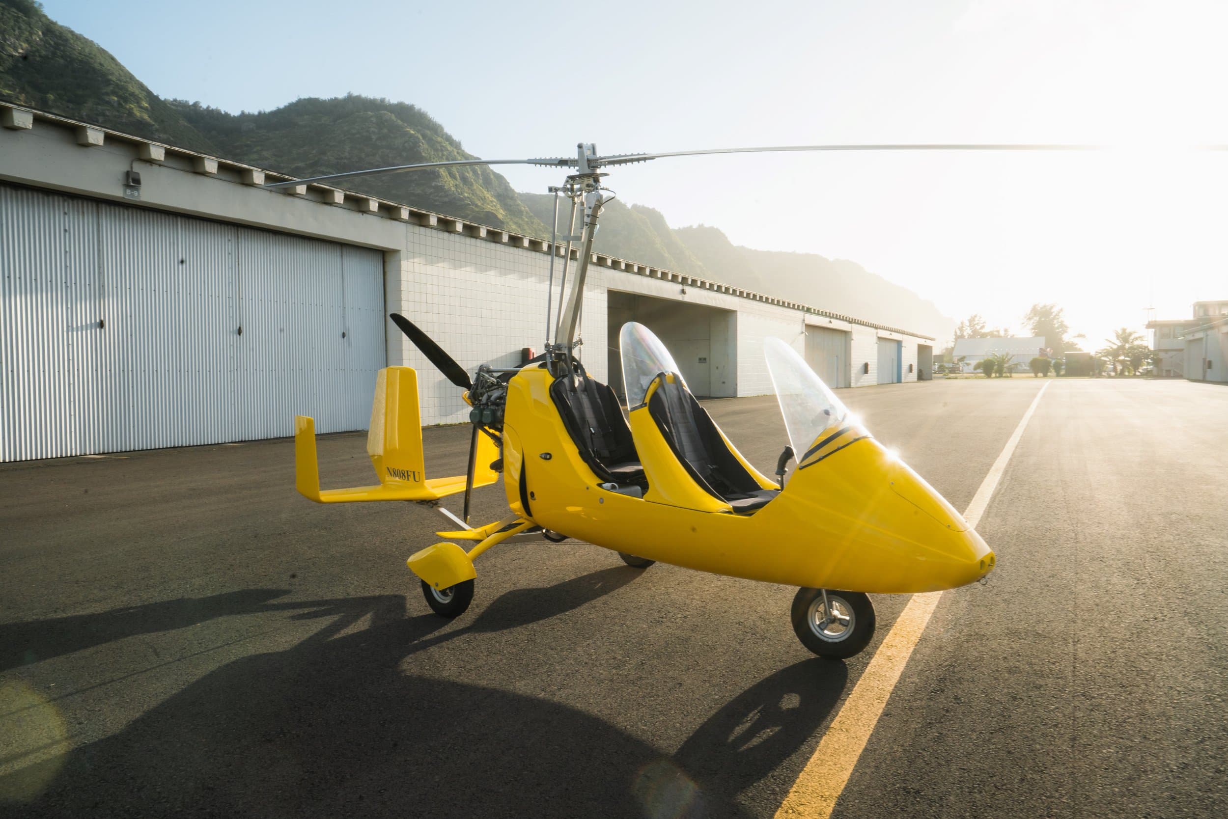 Gyroplane soaring above Oahu's coastline