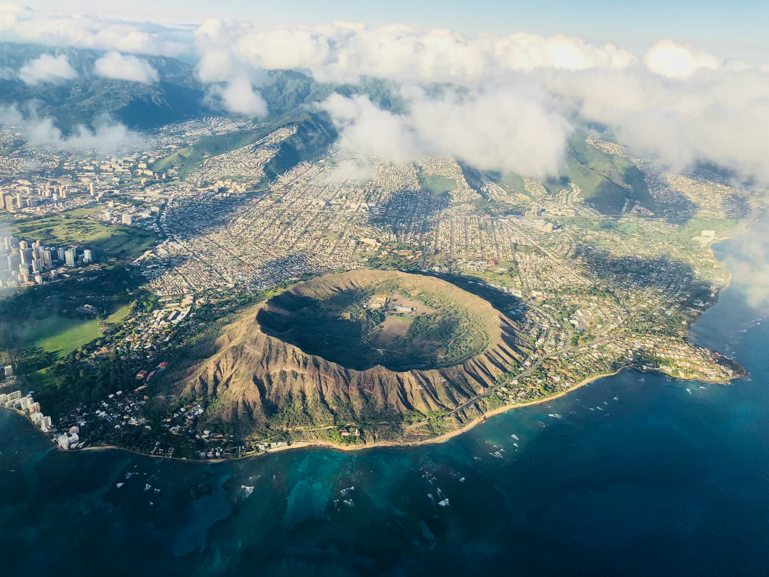 Aerial view of Diamond Head Crater rising above Waikiki on Oahu